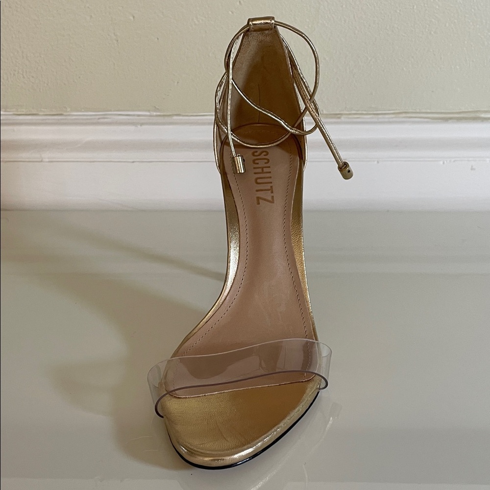 SCHUTZ Metallic Gold Ankle-Tie Clear Strap Sandal